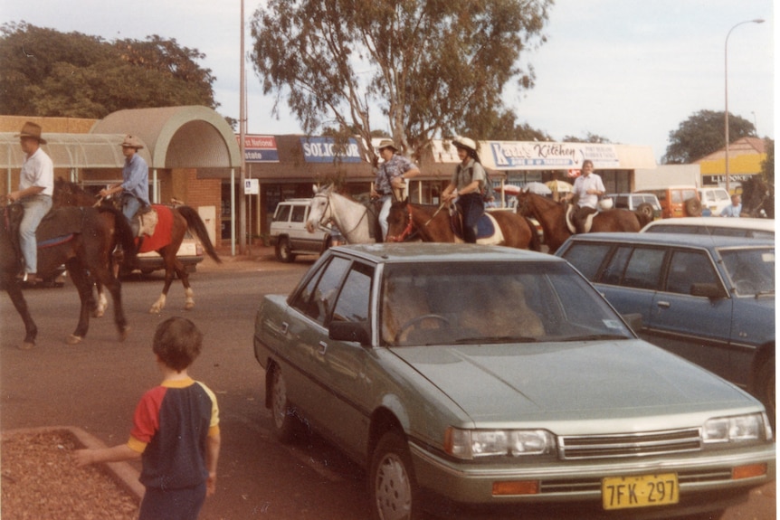 Horses in a parade on the road in Port Hedland