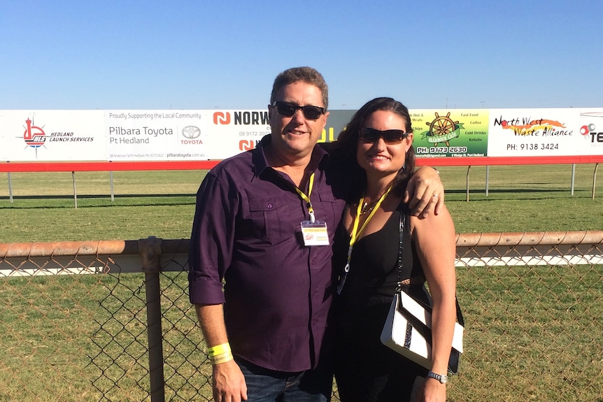 David Murphy and his wife Port Hedland races next to grass