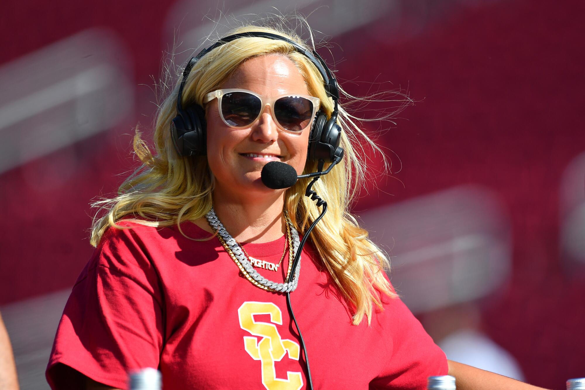 Jennifer Cohen wears a headset and looks on before USC played a football game against San Jose State 