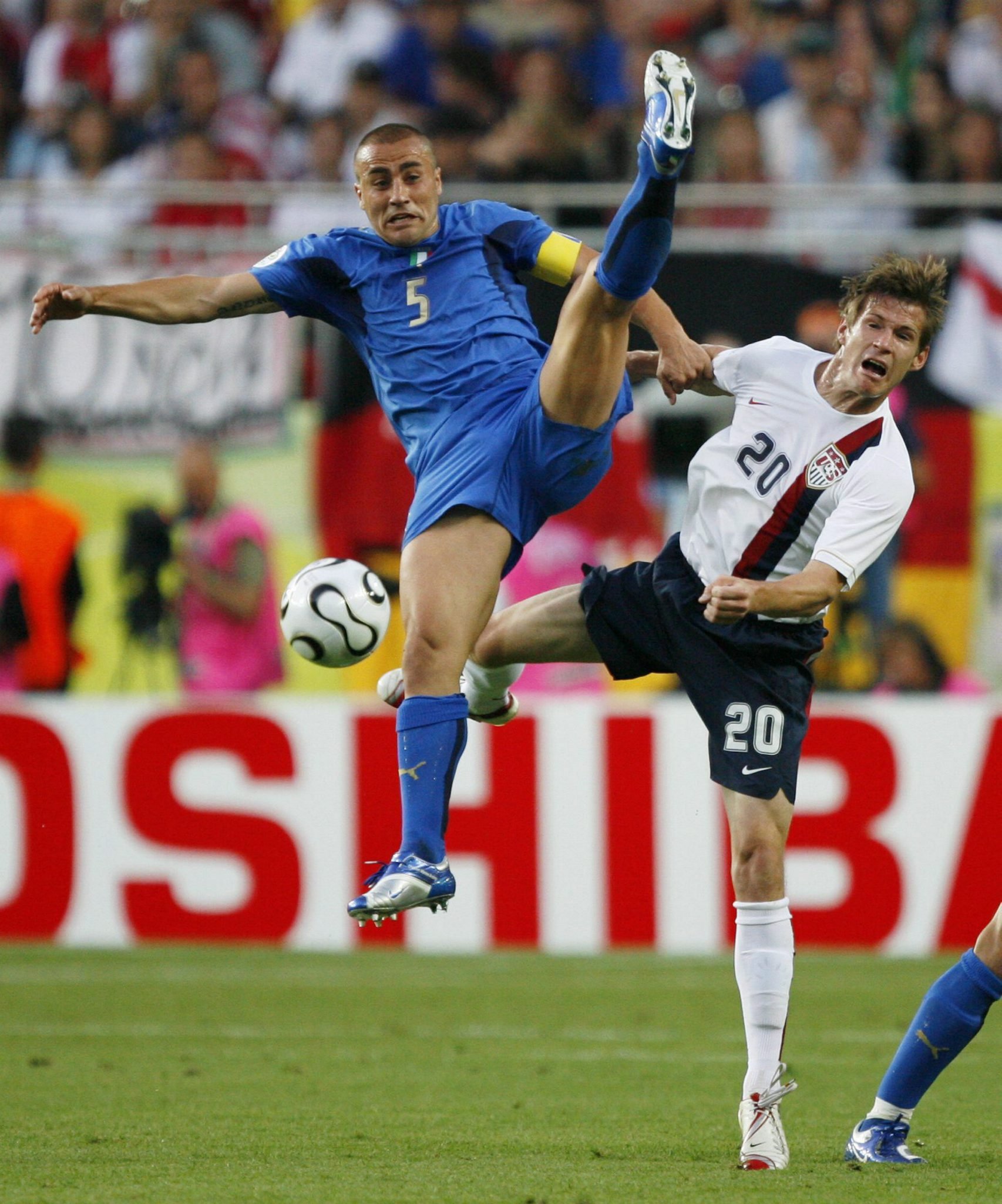 McBride battles with Italy's Fabio Cannavaro at the 2006 World Cup