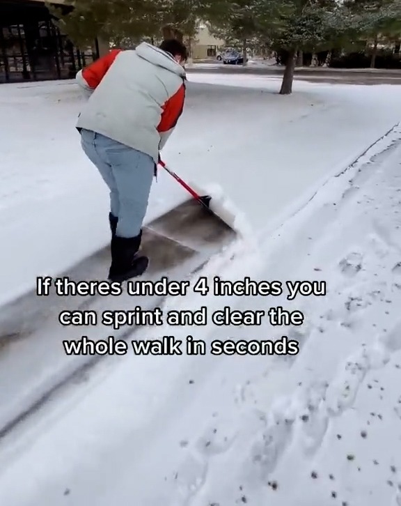 He angled a large shovel in front of him and sprinted for fast clearing