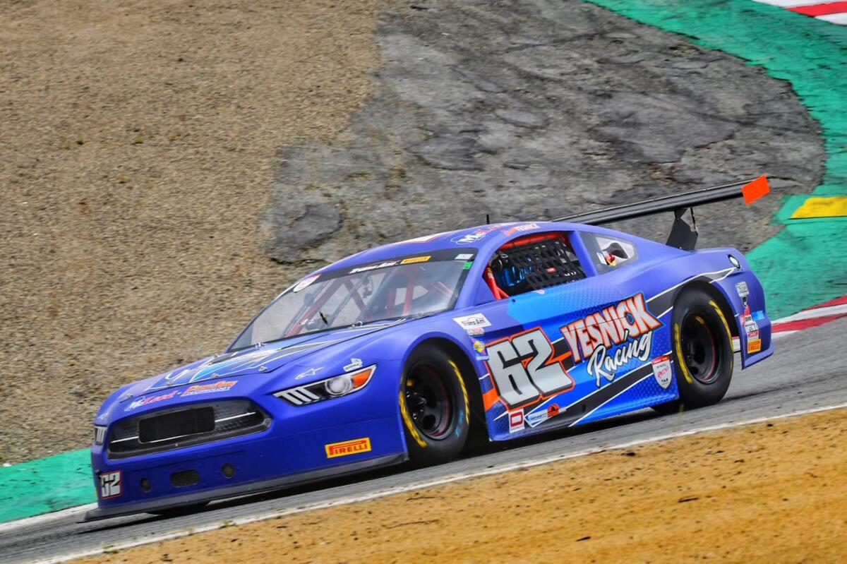 Jacob Yesnick steers his car through a downhill portion of track during a Trans Am 2 series race.