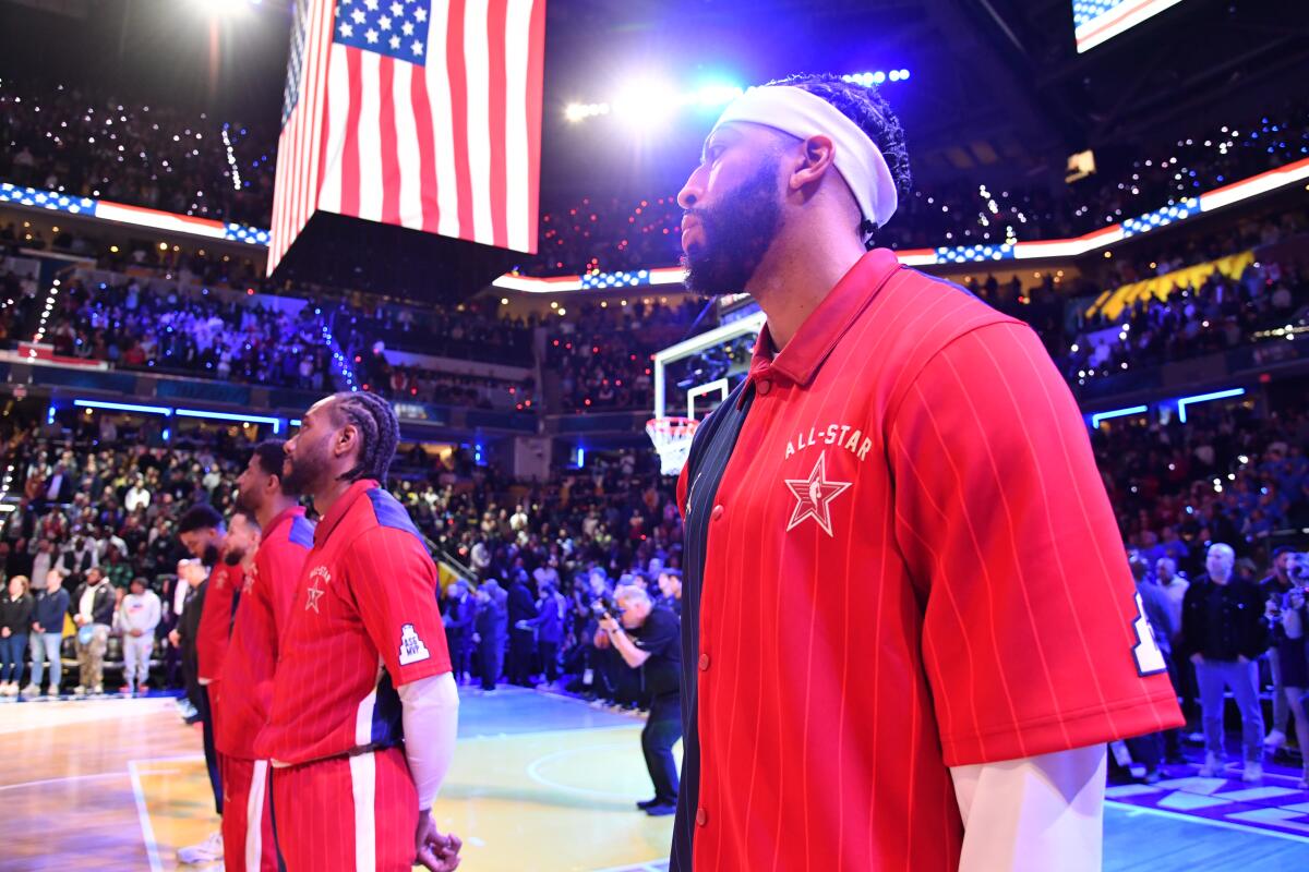 Lakers star Anthony Davis stands during the national anthem before the NBA All-Star Game on Sunday.