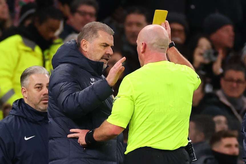 Ange Postecoglou is shown a yellow card