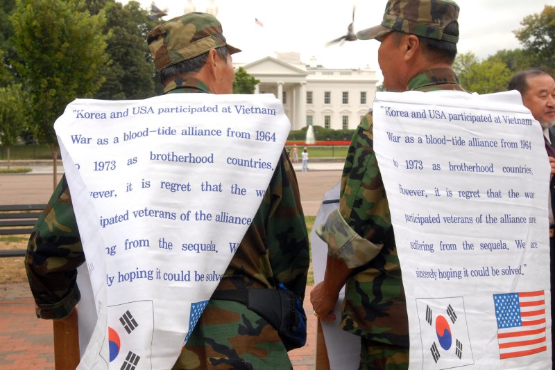 Members of the Korean Disabled Veteran's Association for Agent Orange hold a vigil near the White House in August 2006. The VA is now proposing an expansion of eligibility for benefits for those exposed to the toxic chemical while serving in the U.S. military. File Photo by Roger L. Wollenberg/UPI