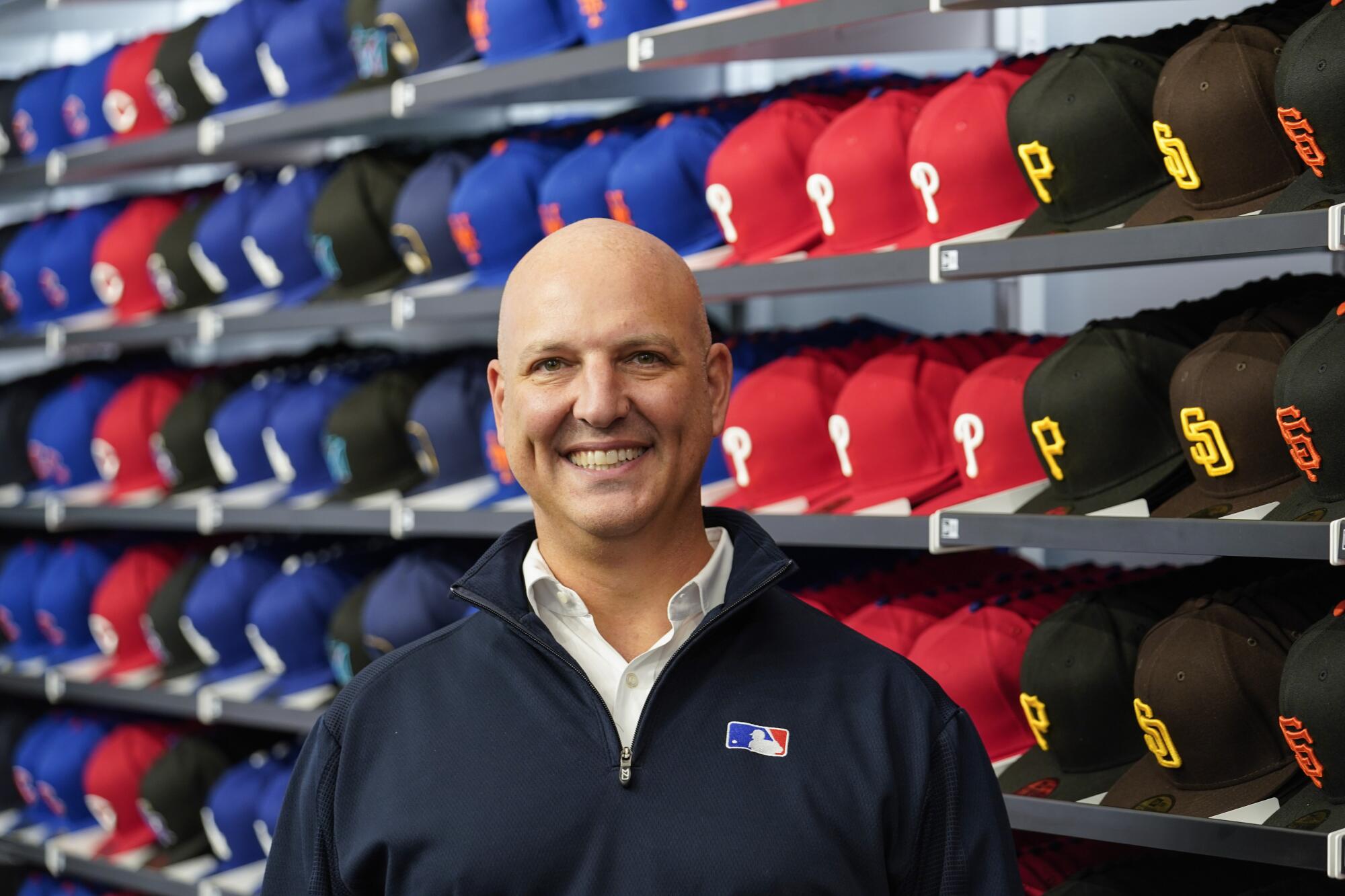 MLB’s chief revenue officer Noah Garden poses at the MLB Flagship store Wednesday, Sept. 30, 2020, in New York.