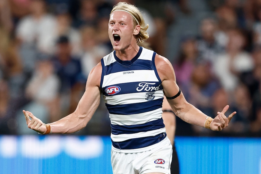 Ollie Dempsey celebrates during Geelong's round-one AFL win over St Kilda.
