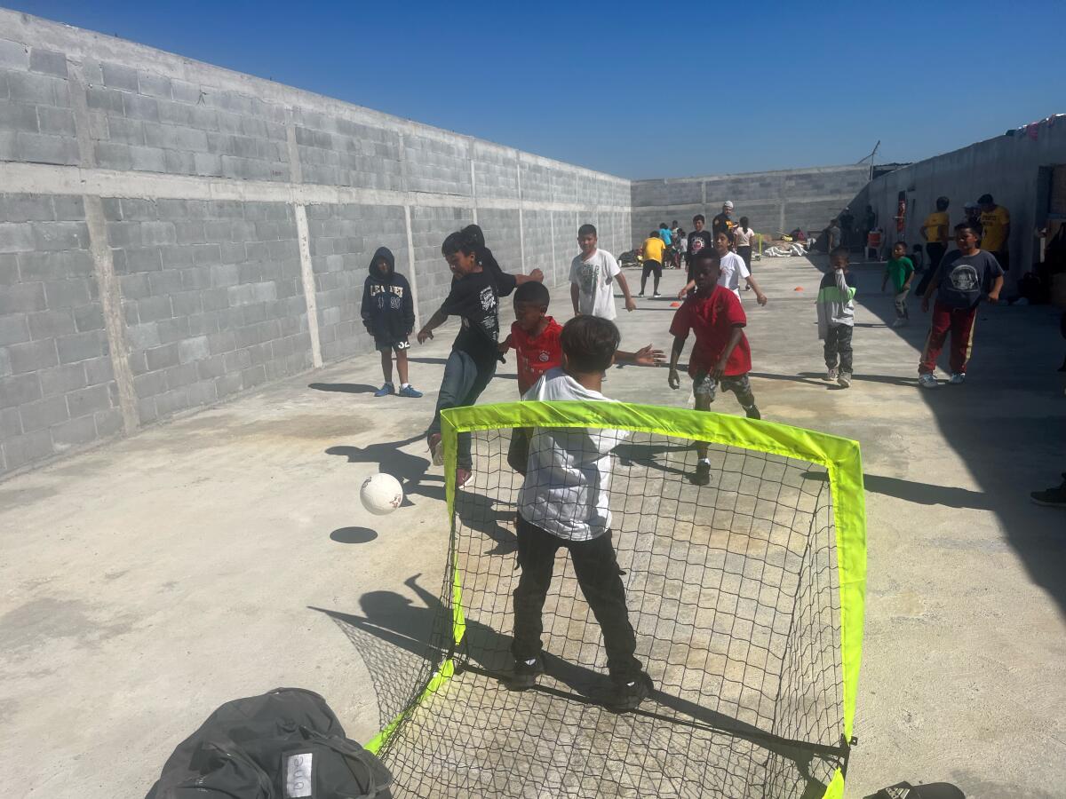 Children play soccer at the Senda de Vida migrant shelter in Reynosa, Mexico.