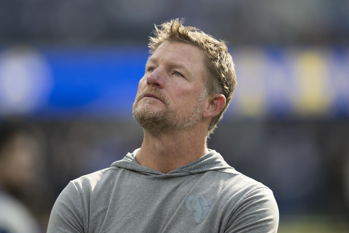 Los Angeles Rams general manager Les Snead looks on before an NFL football game.