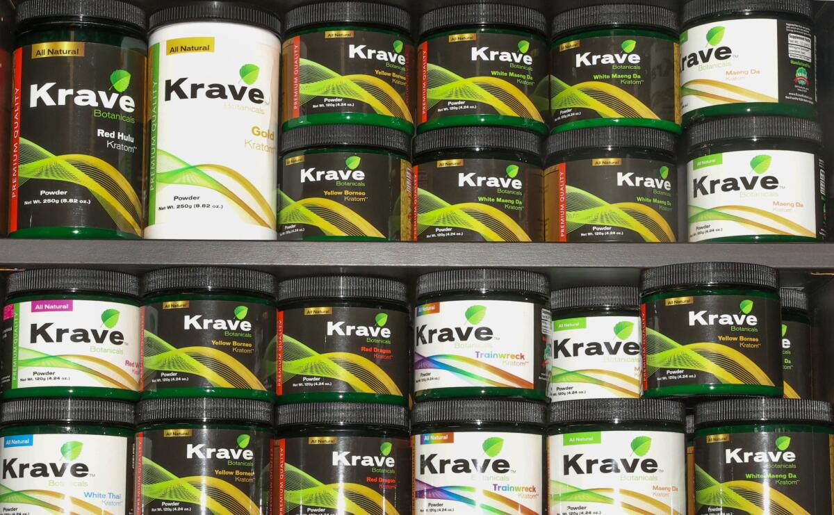 Kratom powder products are displayed at Smoke Shop in Los Angeles.