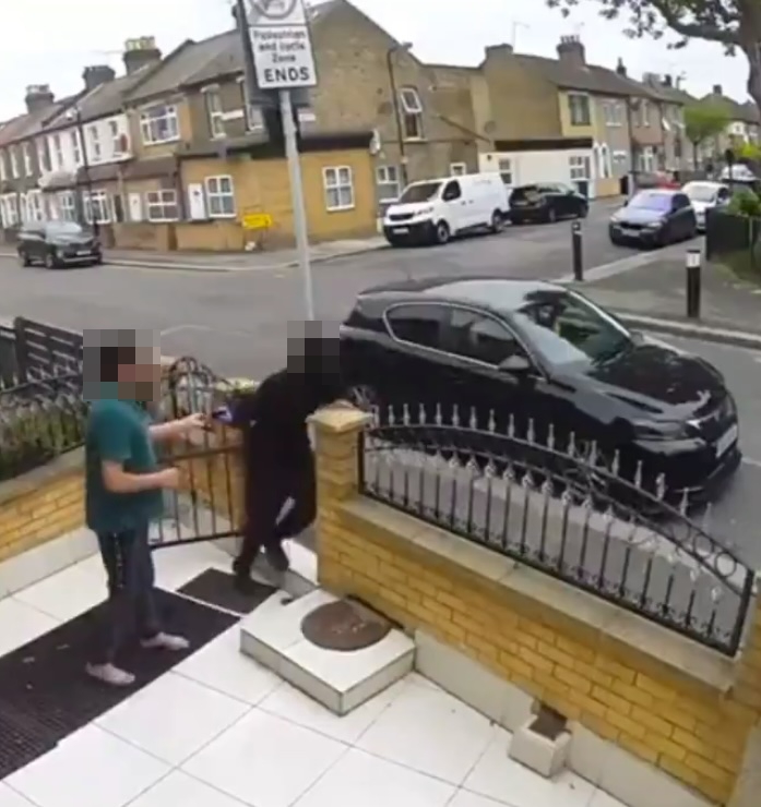 At one point one of the crooks runs up and grabs the man's phone before smashing it into the ground