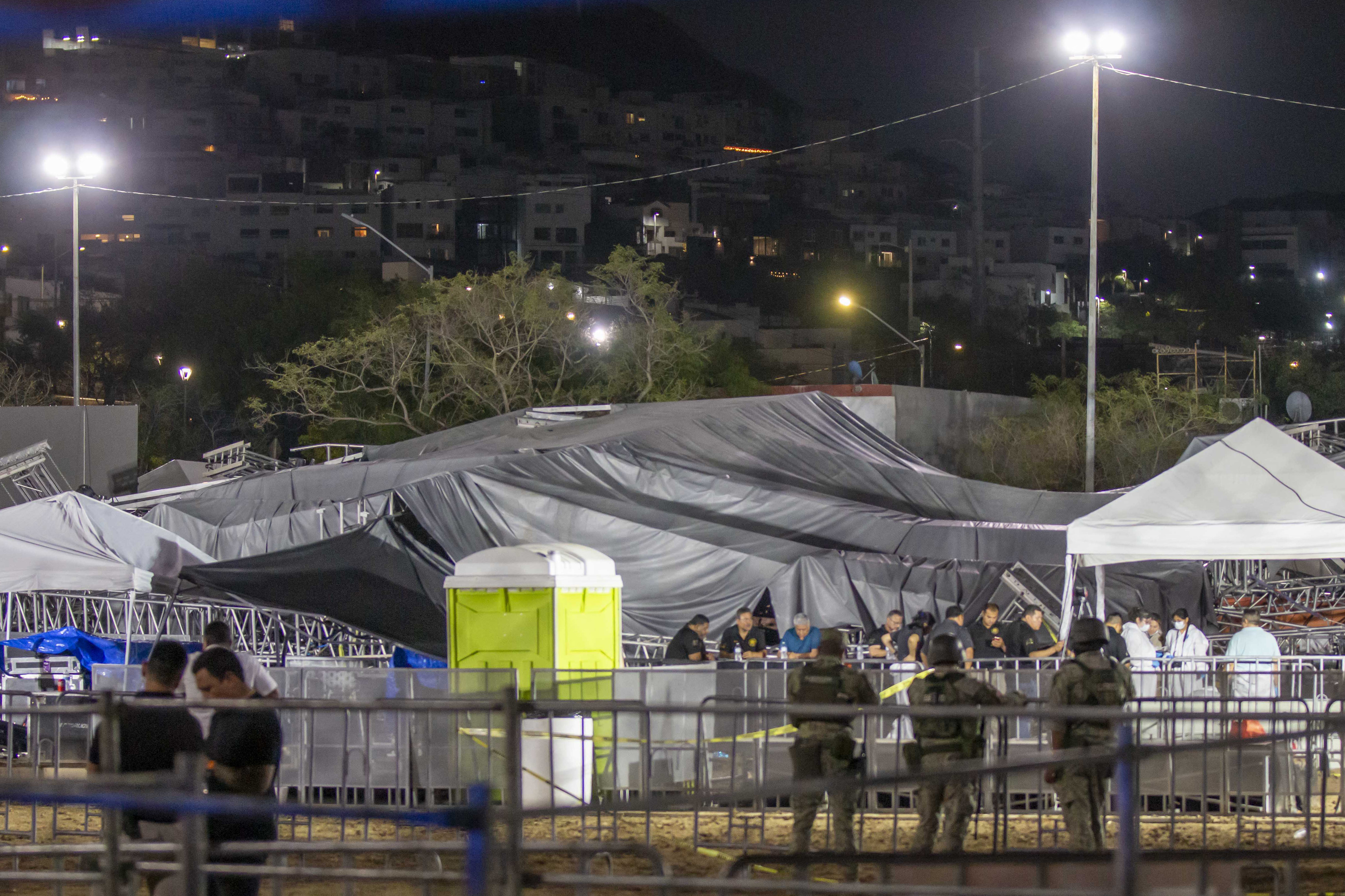 The debris is seen covered with a tarp