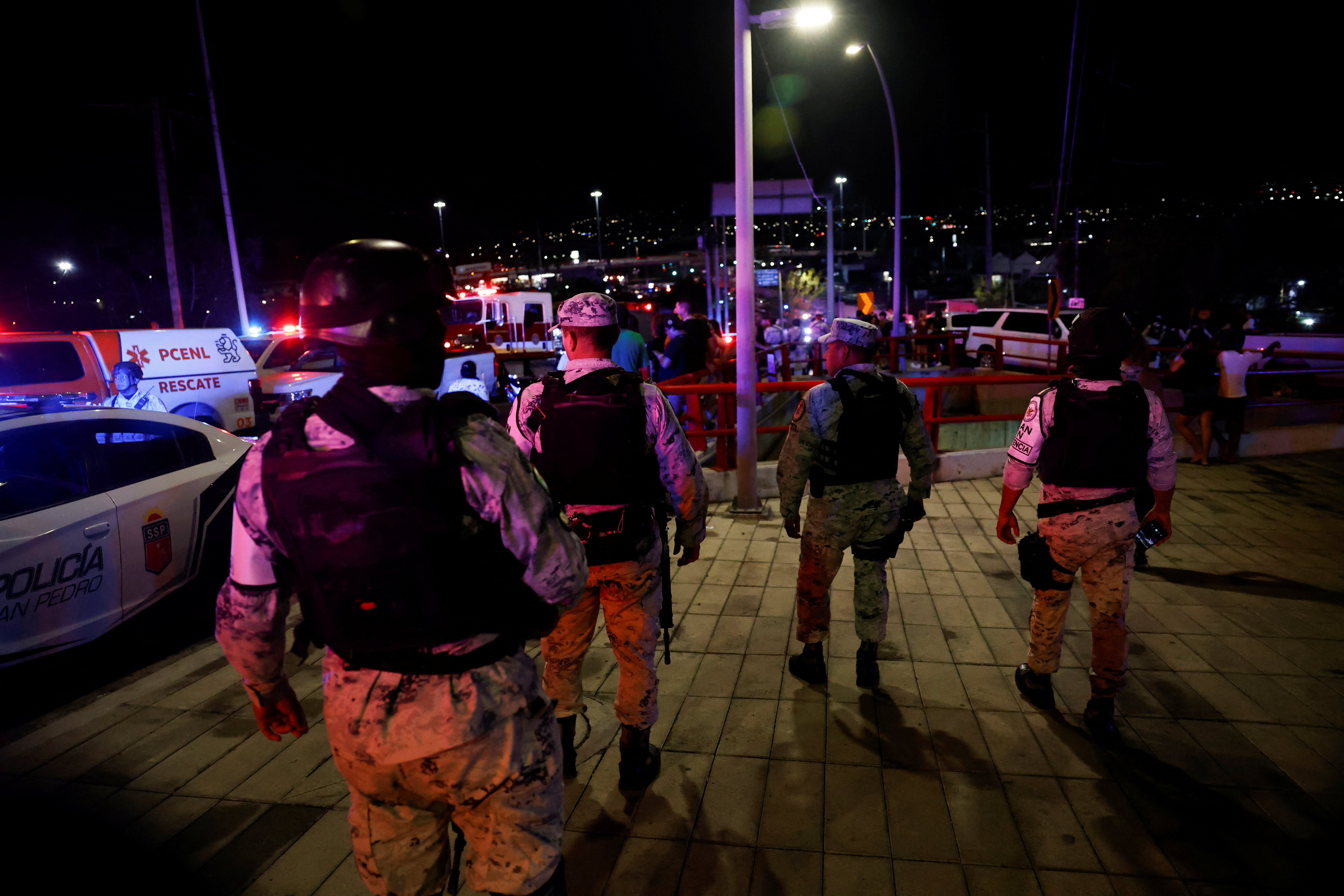 Soldiers stand guard
