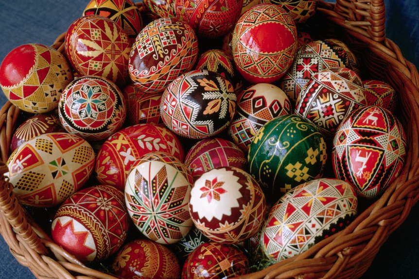 A basket of decorated eggs