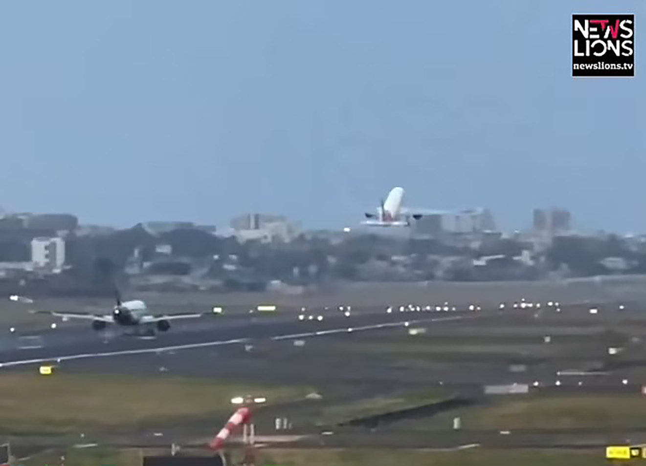 One aircraft landed just as another took off