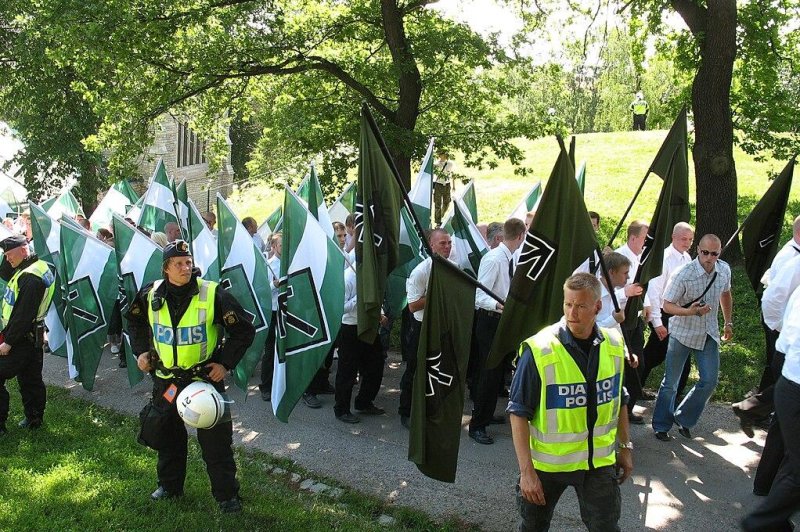 The U.S. State Department Friday designated the Nordic Resistance Movement as Specially Designated Global Terrorists. Pictured are Swedish members of the NRM during a demonstration in Stockholm. Photo by Peter Isotalo courtesy of Wikimedia Commons