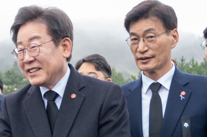 The man convicted of stabbing South Korean opposition leader Lee Jae-myung (L) in January received 15 years in prison Friday. The Busan District Court said the attack was violent interference with the freedom of election. File Photo by Darryl Coote/UPI