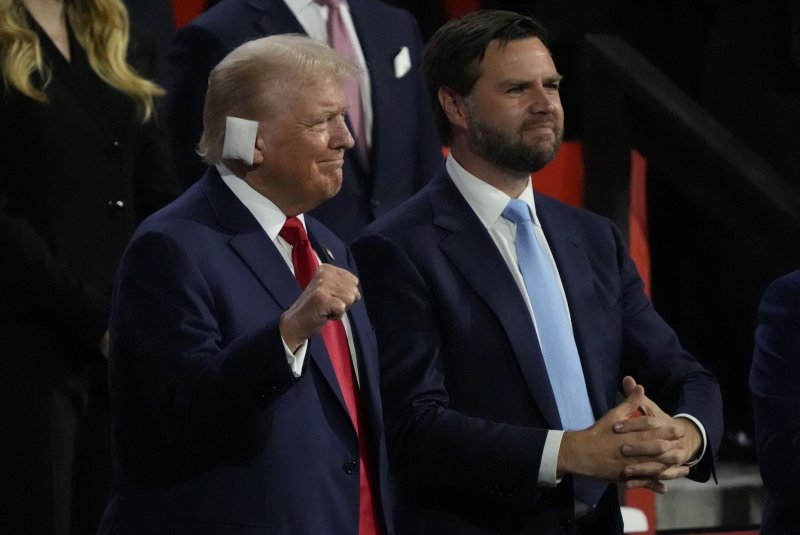 Former President Donald Trump, wearing a bandage following Saturday's assassination attempt, and Vice President nominee JD Vance appear at the 2024 Republican National Convention at Fiserv Forum in Milwaukee, Wisconsin on Monday. The city of Milwaukee is hosting the 2024 Republican Convention which will run from July 15th through July 18th. Photo by David Banks/UPI