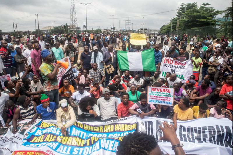 Protests against hunger, high prices and mismanagement of Nigeria's economy turned deadly with at least 13 people killed with Amnesty International accusing authorities of opening fire with live ammunition while authorities blamed "thugs" and Islamist militants for the violence. Photo by Emmanuel Adegboye/EPA-EFE