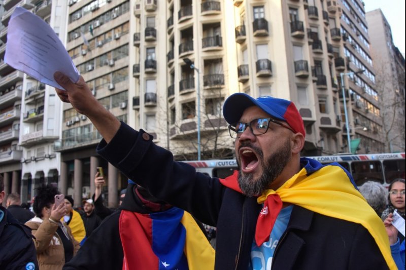 A man shouts slogans during a demonstration against the results of the July 28 Venezuelan elections in Montevideo, Uruguay, on Aug. 17. The United States on Friday condemned a ruling by Venezuela's highest court certifying the disputed results claiming President Nicolas Maduro had won a third term. File Photo by Federico Gutierrez/EPA-EFE