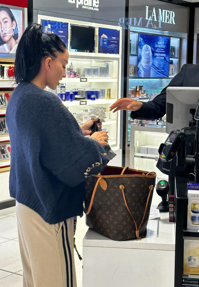 Katie parted with her cash at duty free