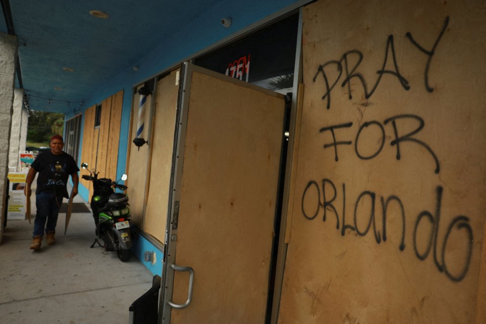 'Pray for Orlando' reads on wood that was placed at a Home Depot