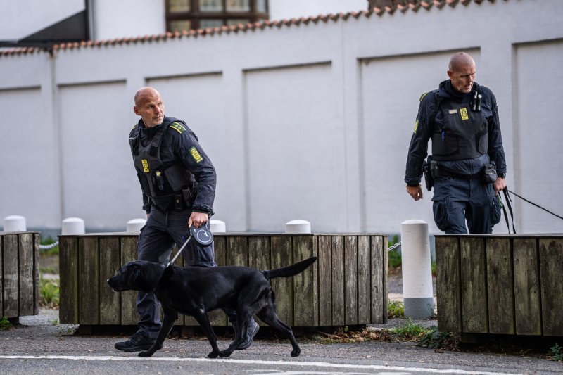 Soldiers inspect the site of two explosions near the Israeli embassy in Copenhagen, Denmark, on Wednesday. Police are conducting initial investigations at the scene of two blasts for a possible connection to the Israeli embassy located in the area, Copenhagen police said on social media platform. No injuries were reported in the incident, the police added. Photo by Emil Helms/EPA-EFE
