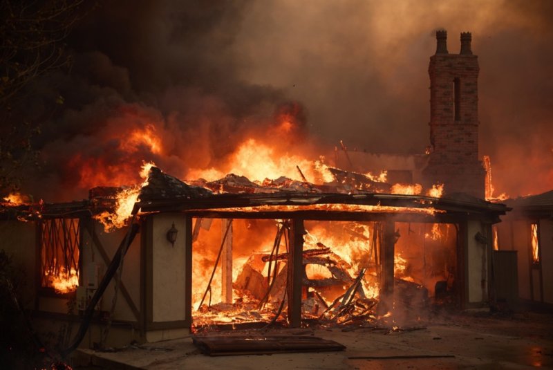 A mansion is destroyed as the Mountain Fire burns in Camarillo, California, on November 6, 2024. Cal Fire said the blaze was 31% contained on Sunday. Photo by Allison Dinner/EPA-EFE