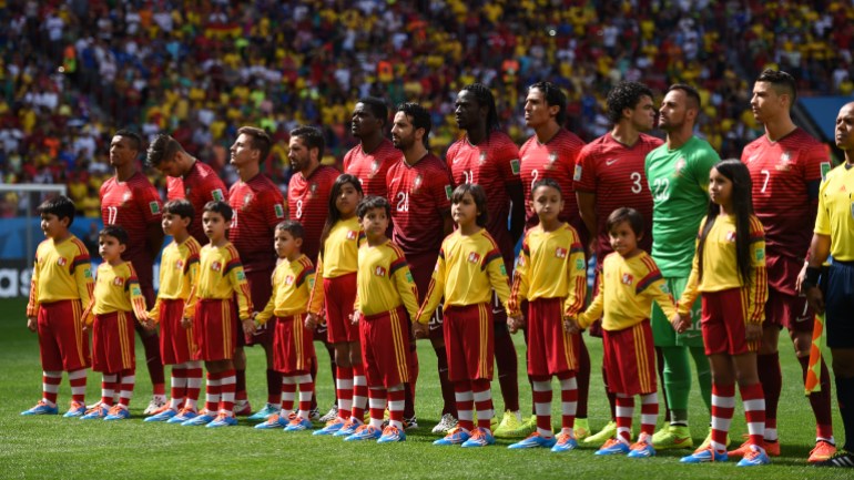 (L-R) Nani, Miguel Veloso, Joao Pereira, Joao Moutinho, William, Ruben Amorim, Eder, Bruno Alves, Pepe, goalkeeper Beto, Cristiano Ronaldo of Portugal line up prior to the FIFA World Cup 2014 group G preliminary round match between Portugal and Ghana at the Estadio National Stadium in Brasilia, Brazil, on 26 June 2014. Photo: Marius Becker/dpa (RESTRICTIONS APPLY: Editorial Use Only, not used in association with any commercial entity - Images must not be used in any form of alert service or push service of any kind including via mobile alert services, downloads to mobile devices or MMS messaging - Images must appear as still images and must not emulate match action video footage - No alteration is made to, and no text or image is superimposed over, any published image which: (a) intentionally obscures or removes a sponsor identification image; or (b) adds or overlays the commercial identification of any third party which is not officially associated with the FIFA World Cup) EDITORIAL USE ONLY | usage worldwide (Photo by Marius Becker/picture alliance via Getty Images)