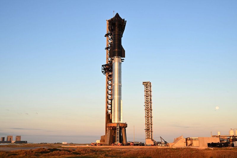 The SpaceX Starship Rocket stands at dawn at Starbase in Boca Chica, Texas, on Saturday. SpaceX plans to launch Starship on its 6th test flight Tuesday following last month's historic booster grab. Photo by Joe Marino/UPI