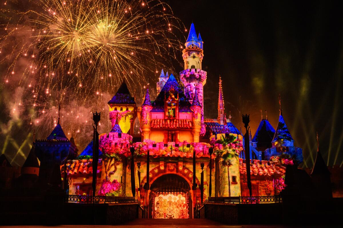 Fireworks erupt around Disneyland's Sleeping Beauty Castle. 