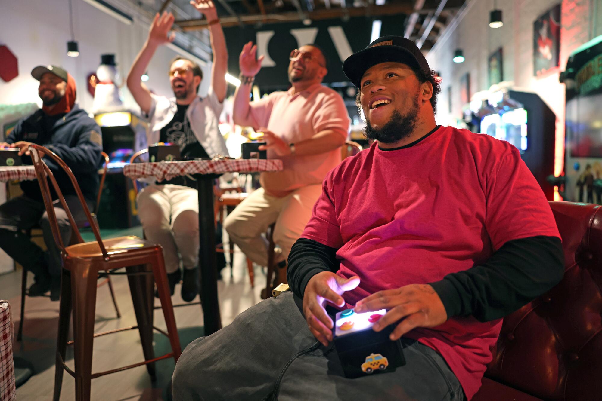 Game tech Quantrel Farris plays games at Two Bit Circus at Third Street Promenade.