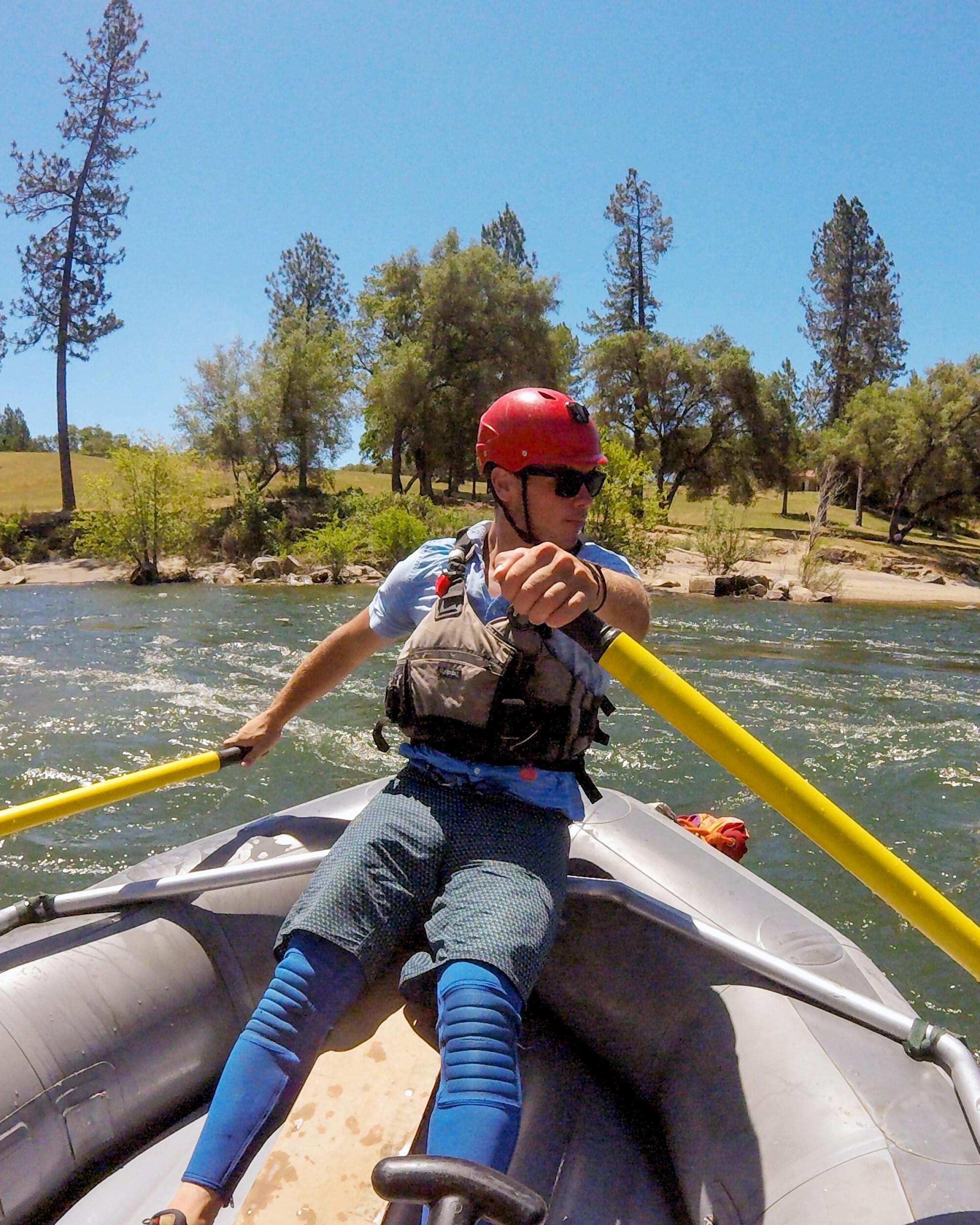 River guide Kyle Brazil navigates the American River, near Coloma, in a dinghy.