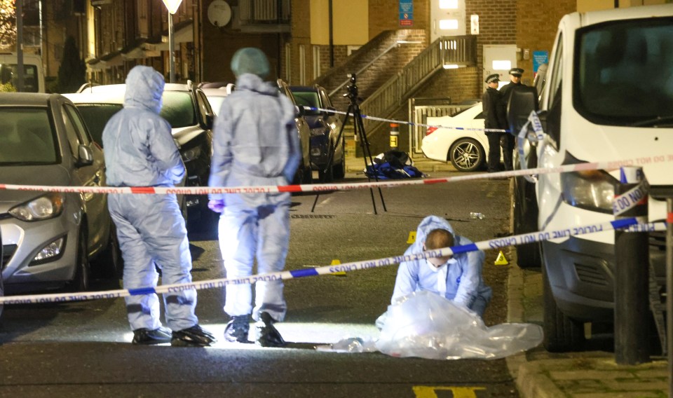 Forensic investigators at a triple shooting crime scene.