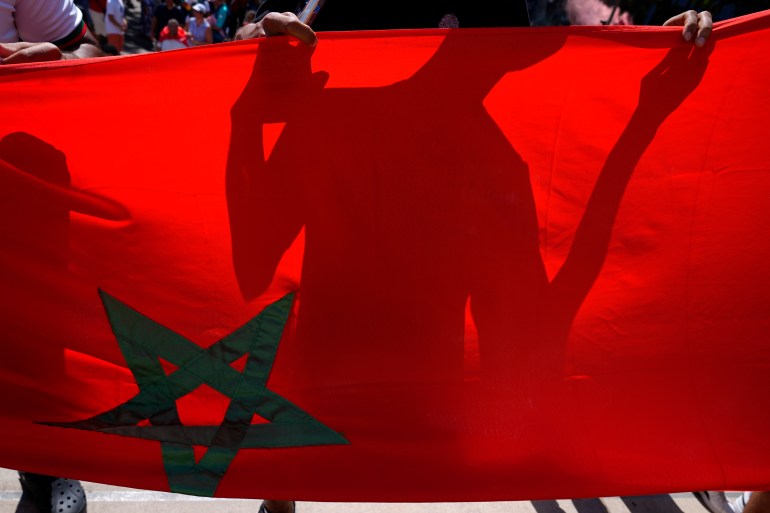 Morocco fans gather outside the Marseille Stadium ahead of a men's semifinal soccer match between Morocco and Spain during the 2024 Summer Olympics in Marseille, France on Monday, Aug. 5, 2024. (AP Photo/Julio Cortez)