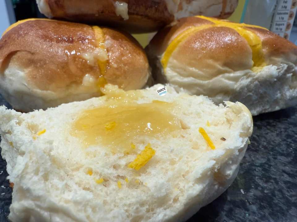 Hot cross buns with lemon curd.