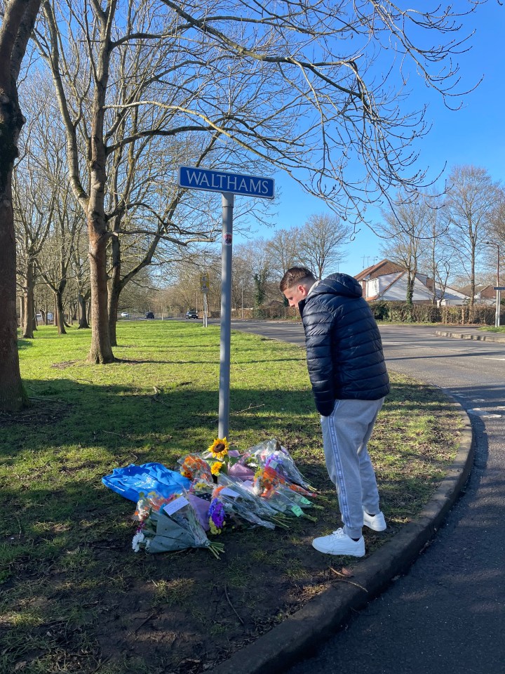 Flowers left near the scene of a collision.