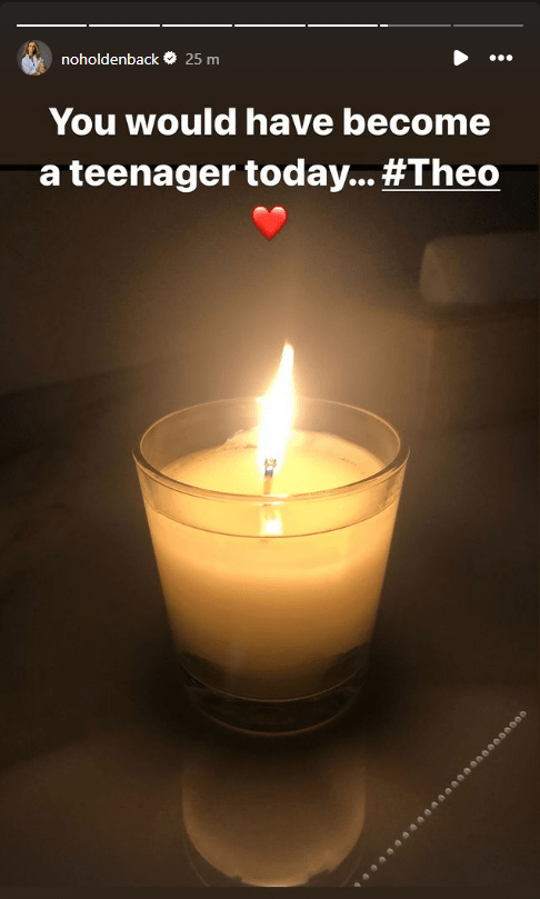 Lit candle with text: "You would have become a teenager today... #Theo"