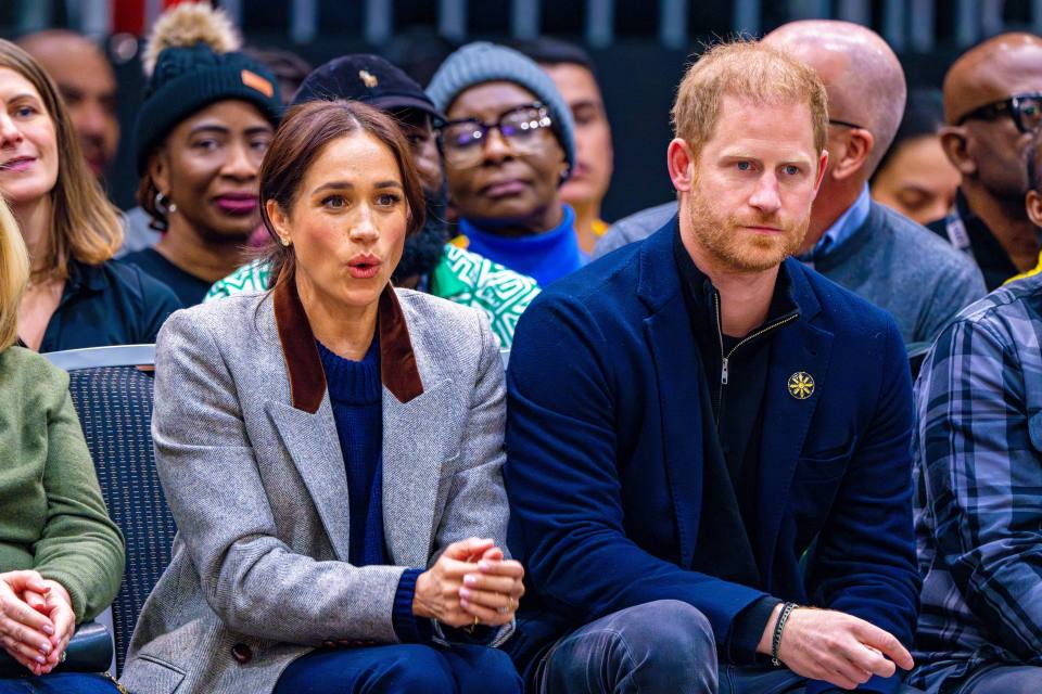 Prince Harry and Meghan Markle at a wheelchair basketball game.