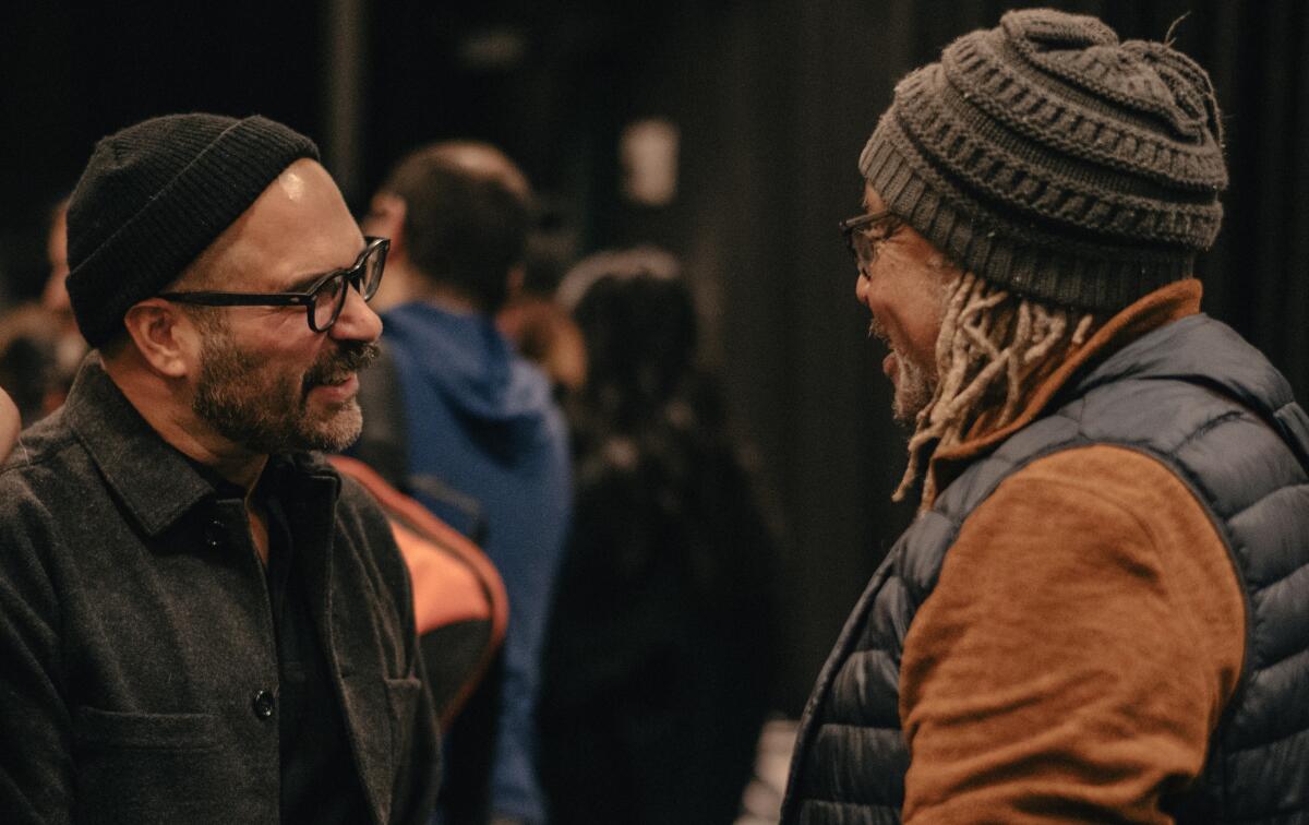 Marco Ramirez speaks with the real life Cuban bandleader Juan de Marcos at the show's first rehearsal.
