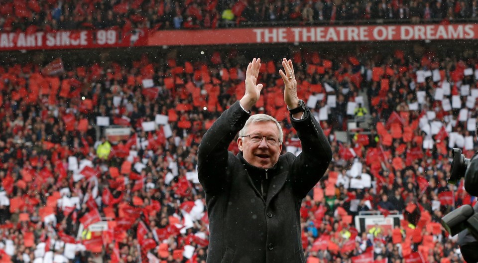 Alex Ferguson waving to fans at Old Trafford.