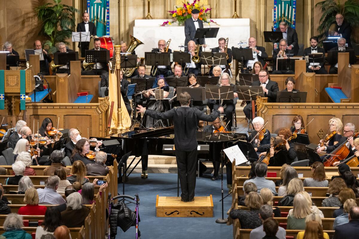 Maxim Kuzin conducts the Palisades Symphony at Westwood United Methodist Church. 