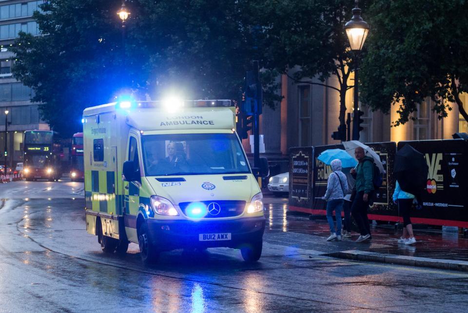 London Ambulance Service responding in the rain.