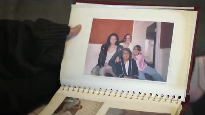 Photo of a family in a photo album.