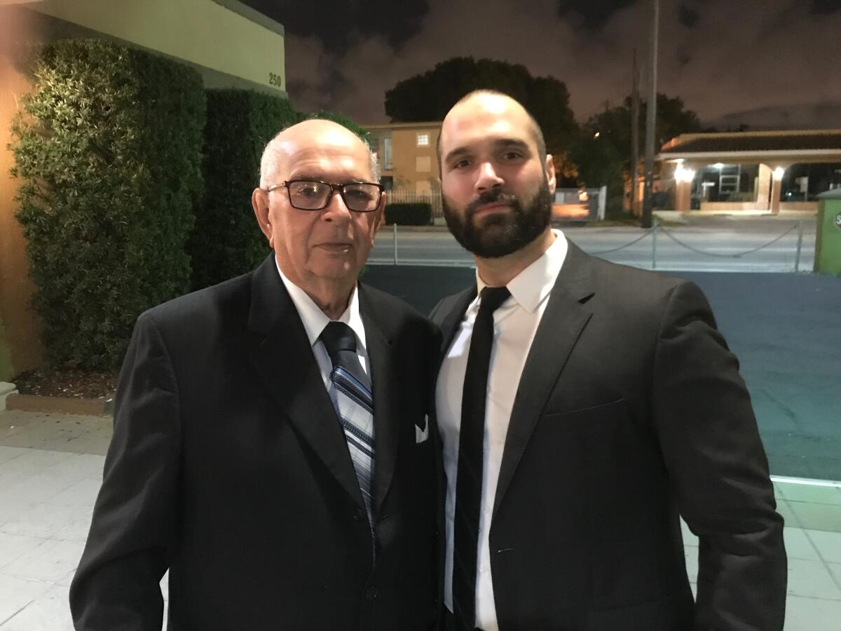 Marco Ramirez poses with his grandfather Felix Delgado