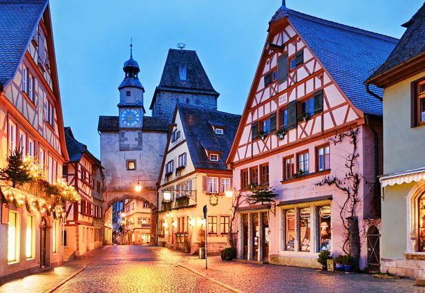 Image of streets of Rothenburg lit up at night