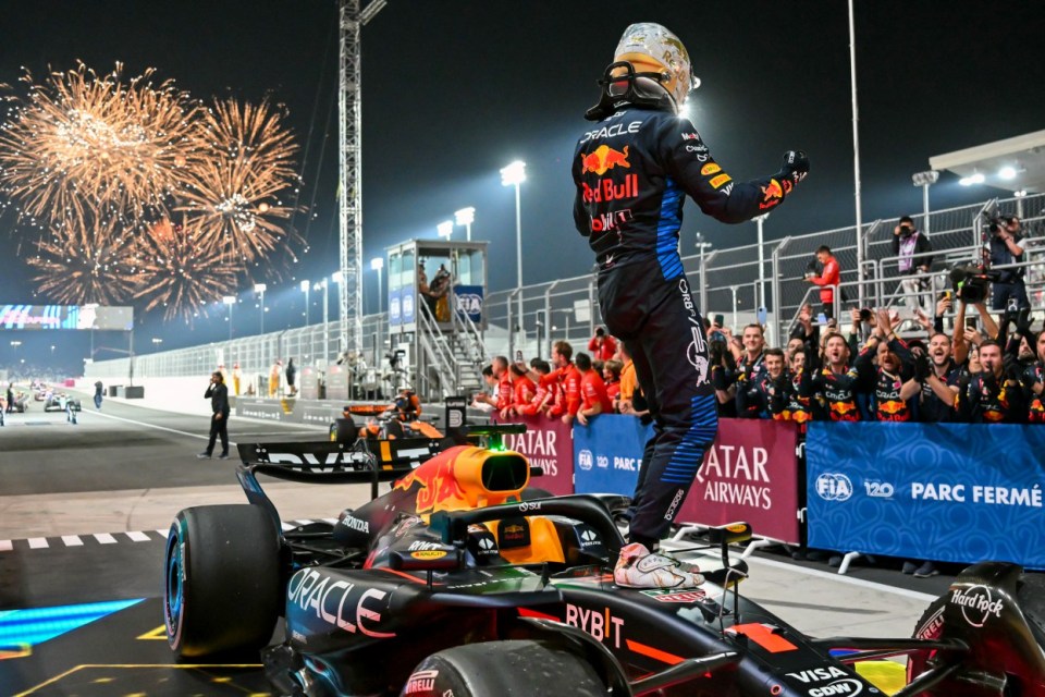 Red Bull Racing's Dutch driver Max Verstappen celebrates as he gets out of his car at parc ferme after winning the Qatari Formula One Grand Prix at the Lusail International Circuit in Lusail, north of Doha, on December 1, 2024. (Photo by Andrej ISAKOVIC / AFP) (Photo by ANDREJ ISAKOVIC/AFP via Getty Images)