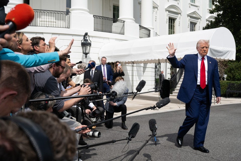 President Trump leaving the White House and waving to the press.