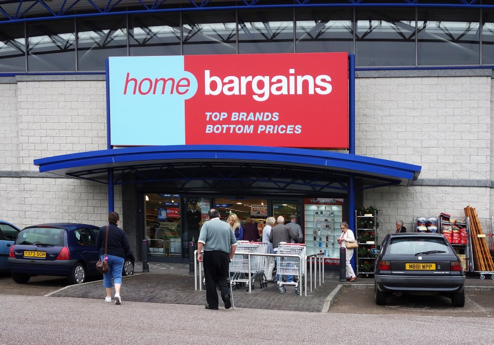 Home Bargains discount store entrance with shoppers.