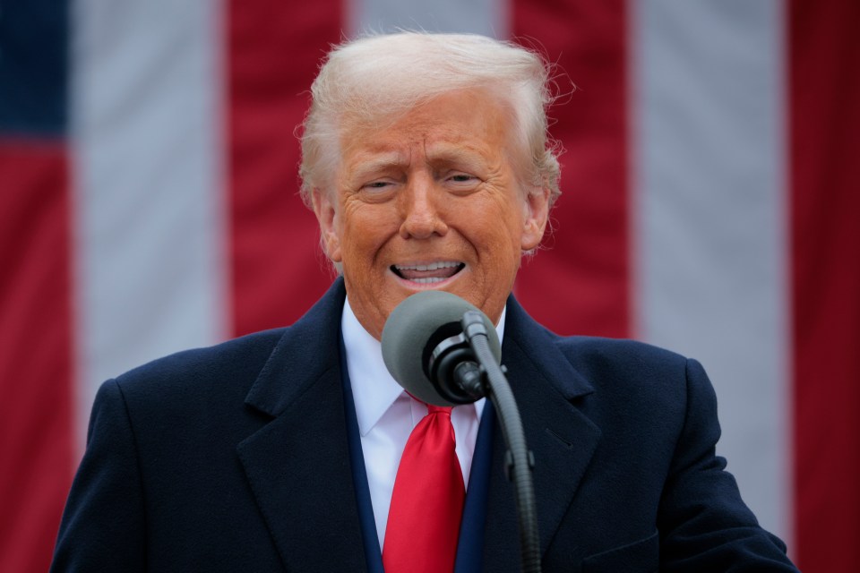 President Donald Trump speaking at a podium.